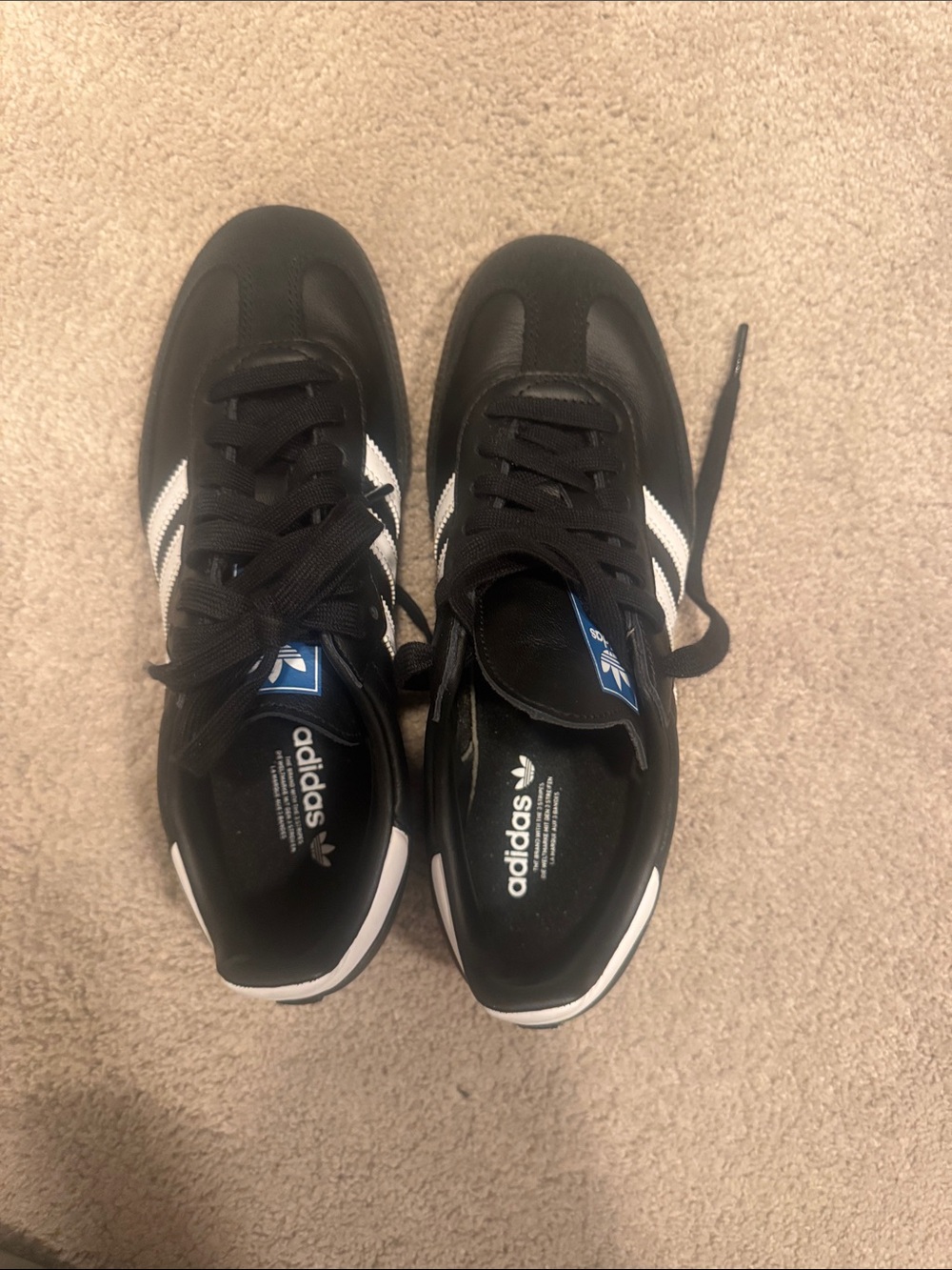 adidas Men’s Black Sneakers with White Stripes
